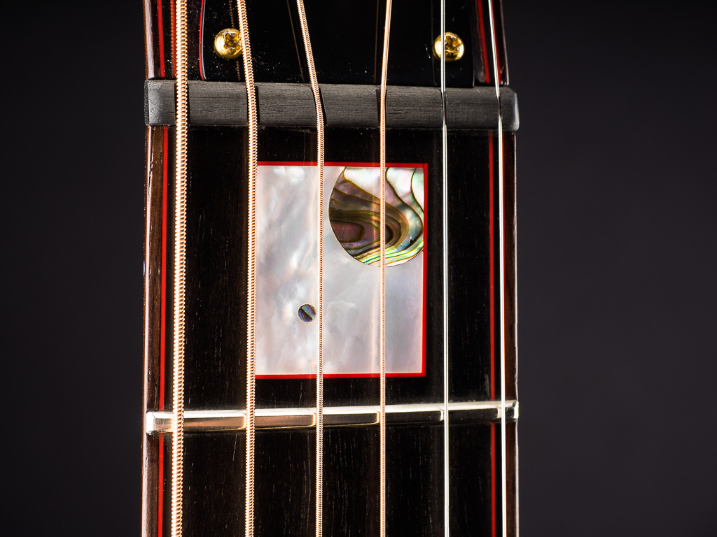 The planets and moon inlay with the carbon fiber nut