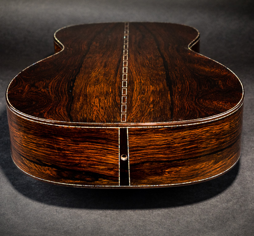 Rosewood binding, end wedge, with abalone trim