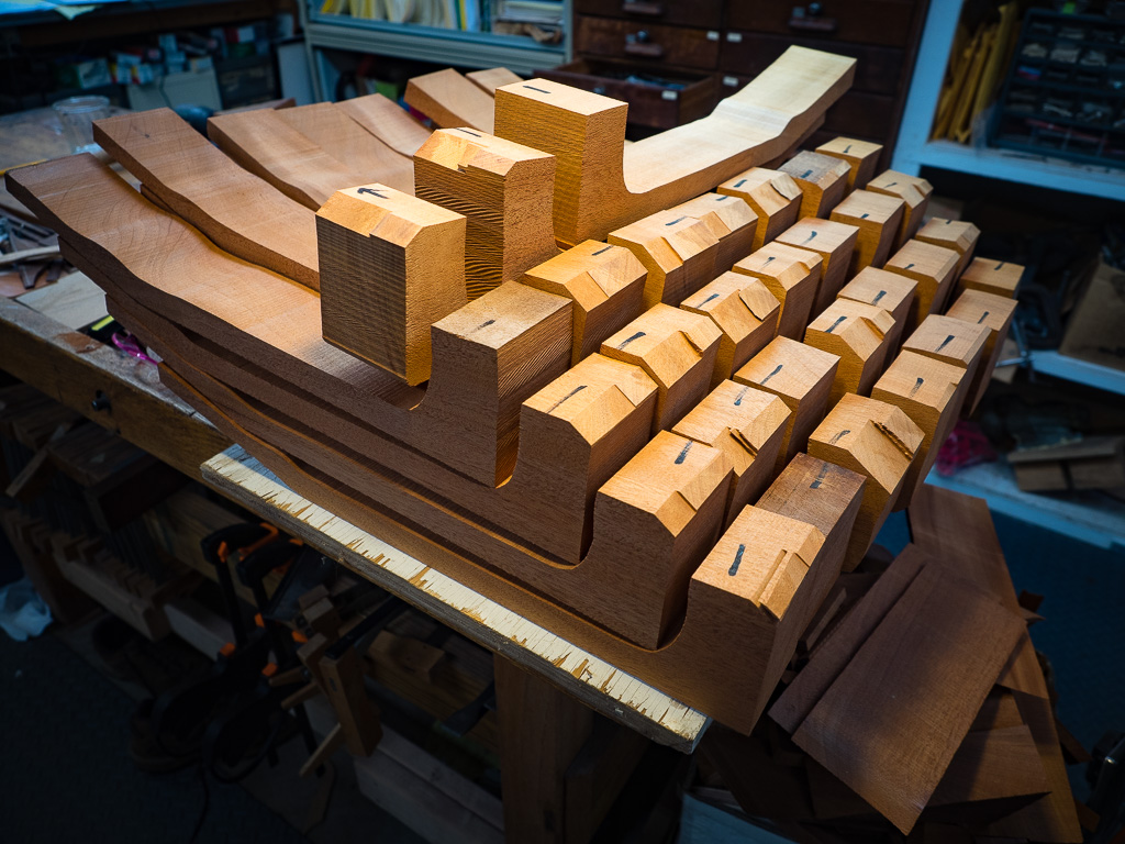 A stack of necks out of one big board