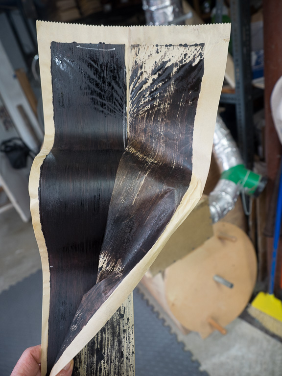 Brown paper absorbs the extra resin that boils out during the bending.