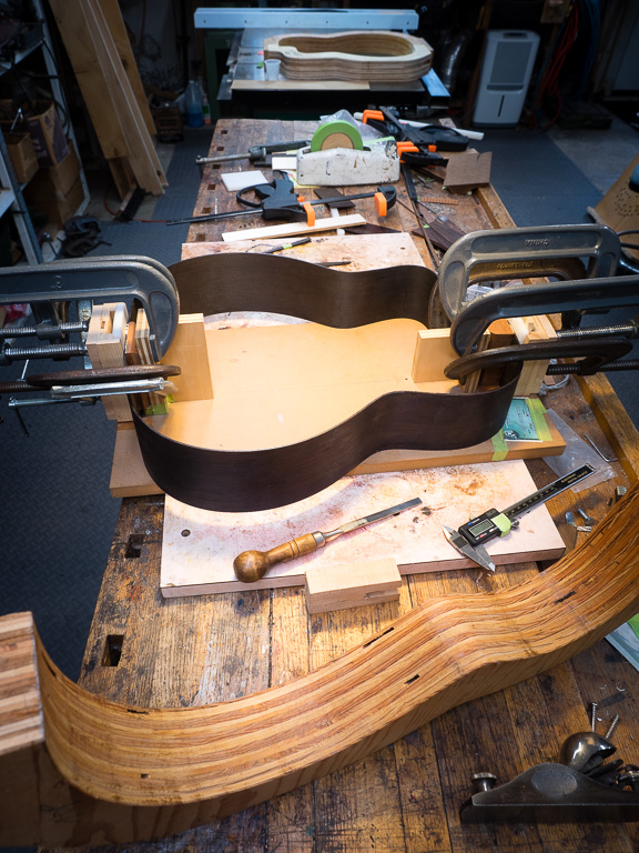 A different view of gluing on the head and tail block.