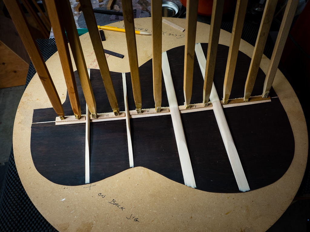 Using the go bars to glue down the center strip.