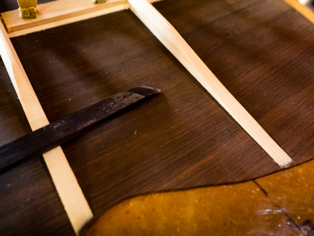 This is my sharpened ebony stick for cleaning glue. It is skewed on the other end the opposite way.