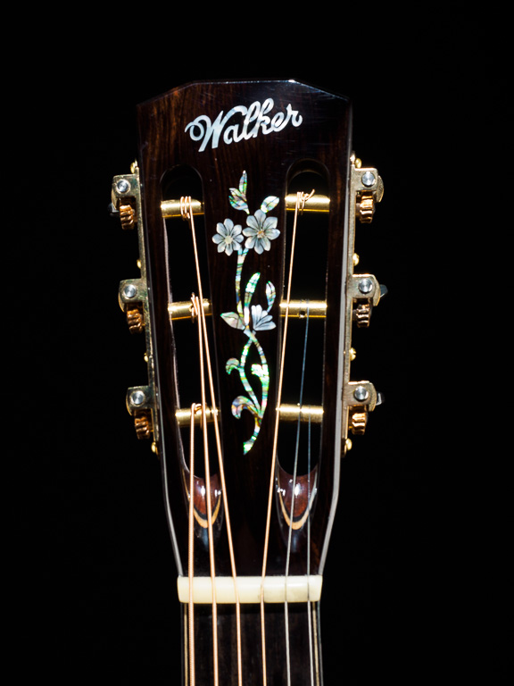 Flower vine inlay proportioned for 12 fret headstock