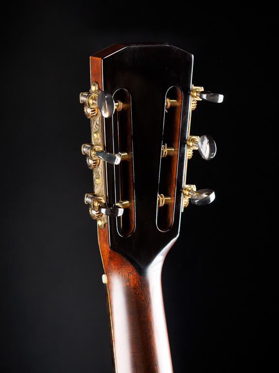 Ebony overlay on the back of the headstock