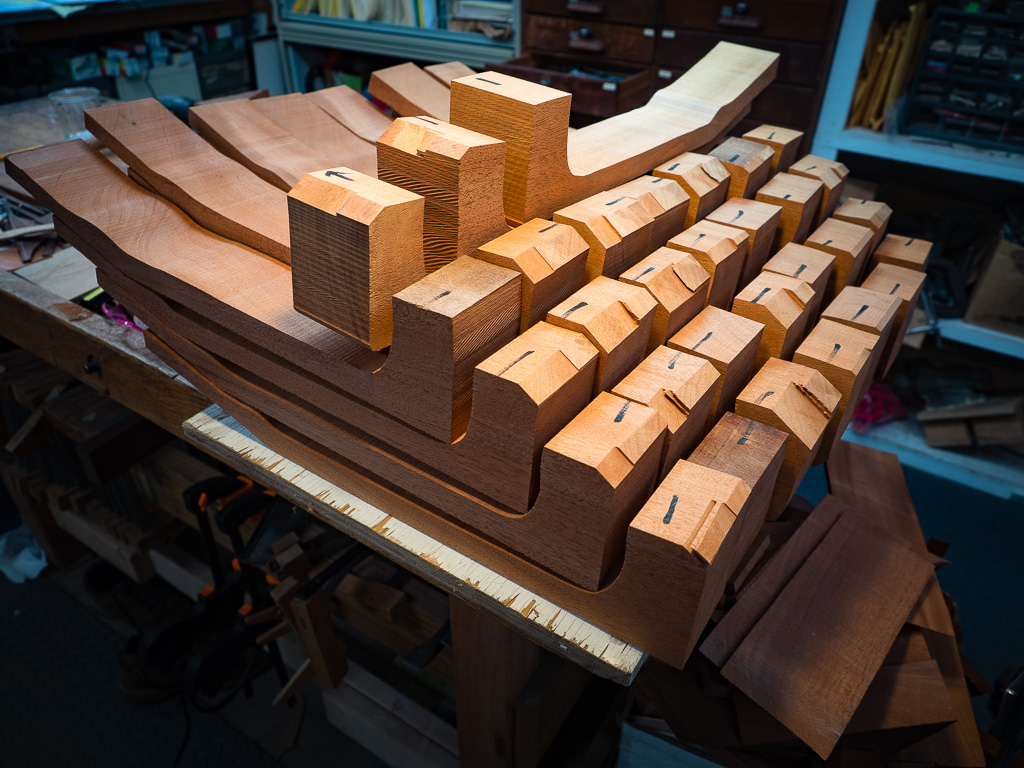 A stack of necks out of one big board